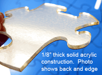 View of the back of acrylic puzzle piece showing sturdy construction.  Acrylic Custom Puzzle