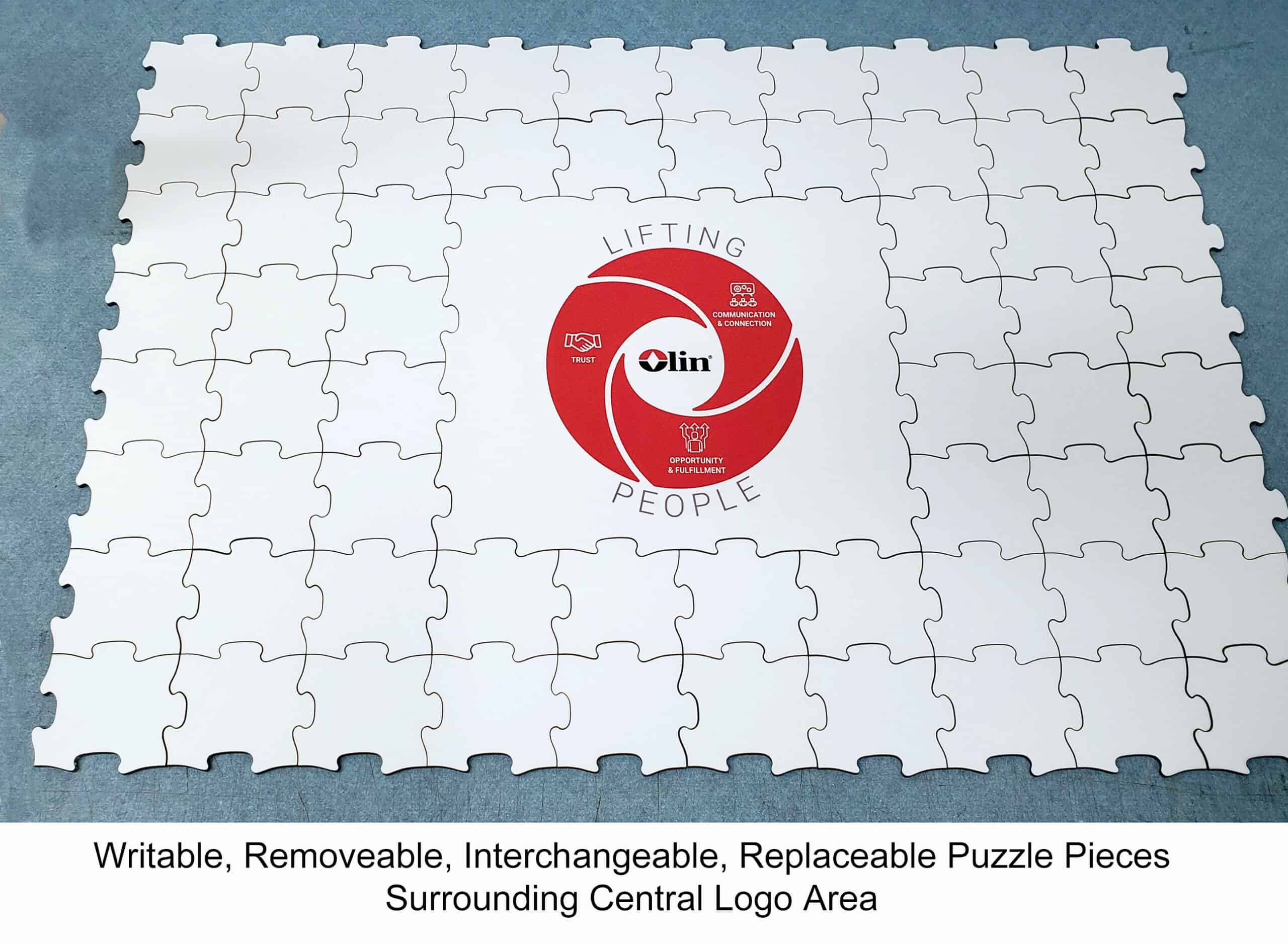 Custom puzzle example of logo puzzle surrounded by same shape writable pieces that go anywhere